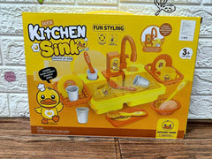 Children's water basin with automatic faucet